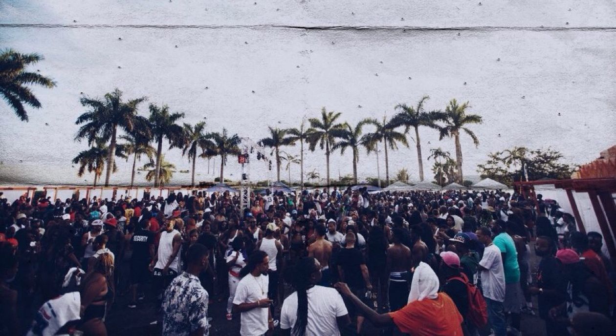 Guests gathered at an outdoor pool-party event