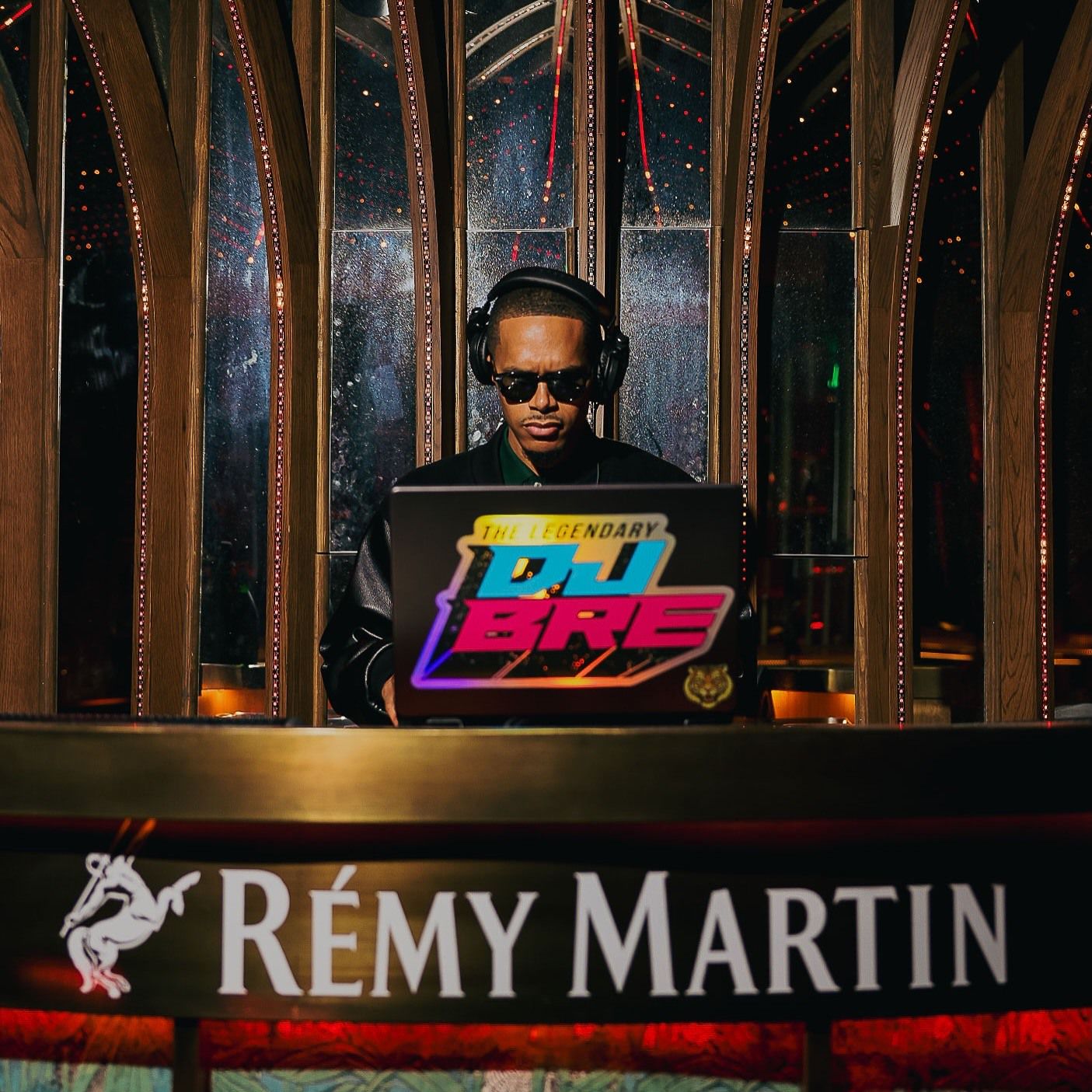 DJ BRE behind the booth during a Rémy Martin brand experience
