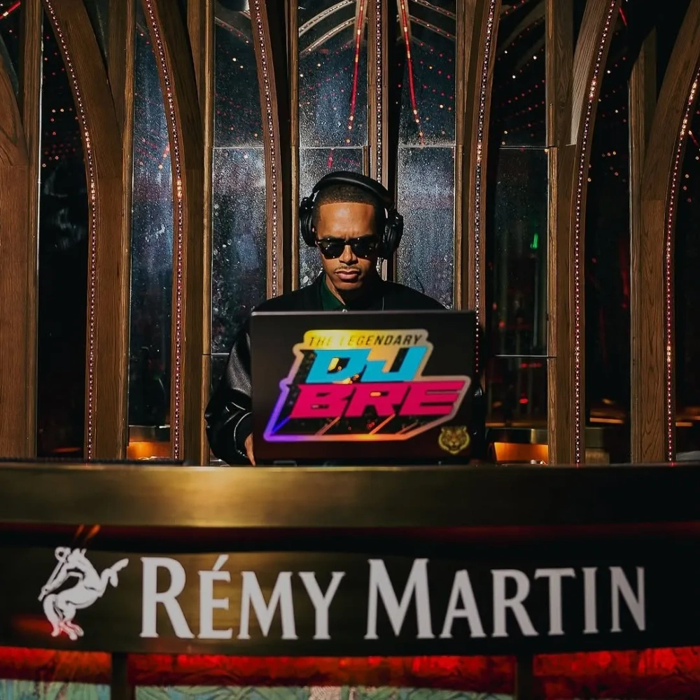 DJ BRE performing at a Rémy Martin brand event